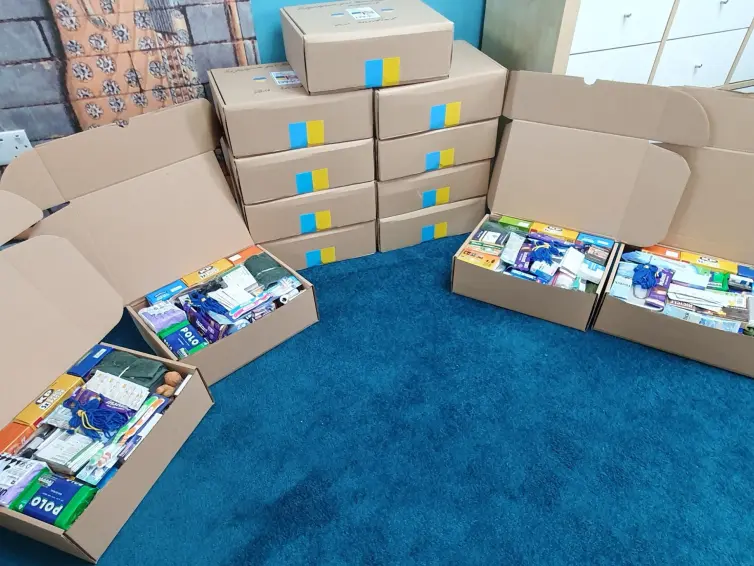 Stack of shoebox gifts.