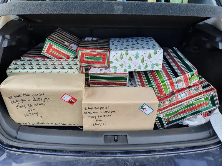 Christmas presents in car boot.
